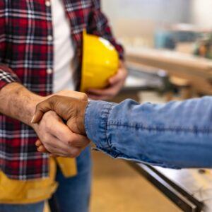 contractor and customer shaking hands - HVAC maintenance services in North Texas